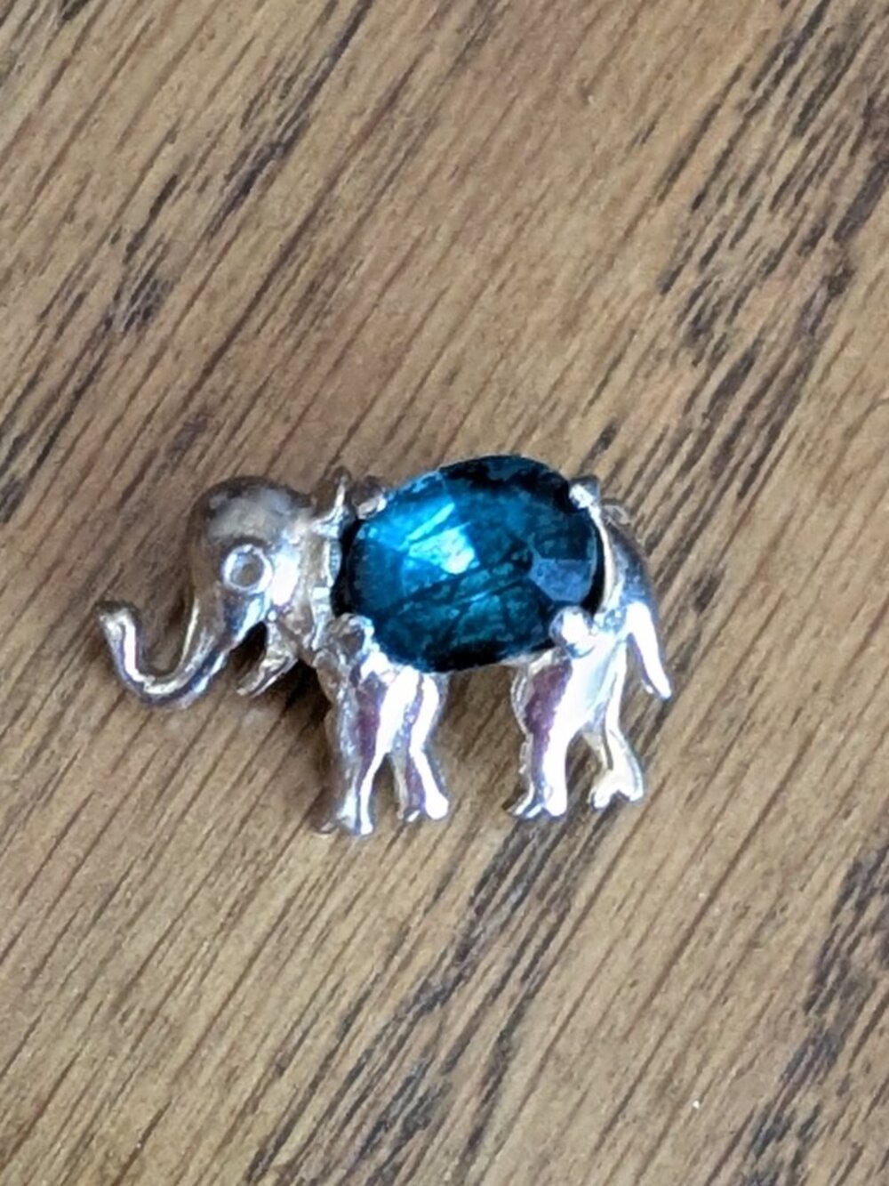 Elephant pin with blue stone